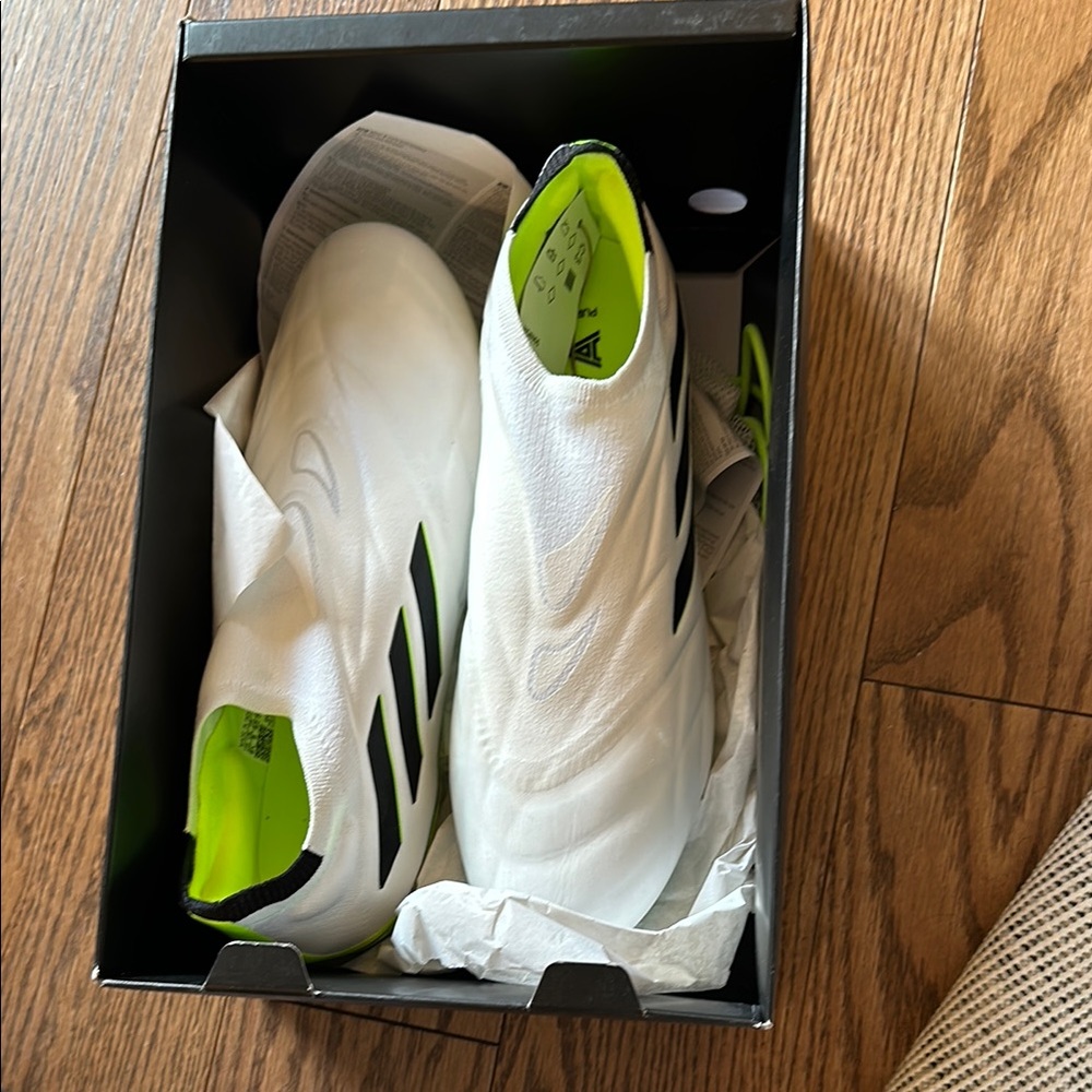 adidas White Athletic Shoes with Slip-On Design and Seamless Upper